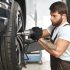 mechanic-changing-wheel-hubcap-automobile (1)